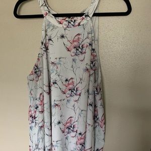 White floral top with flowing detail